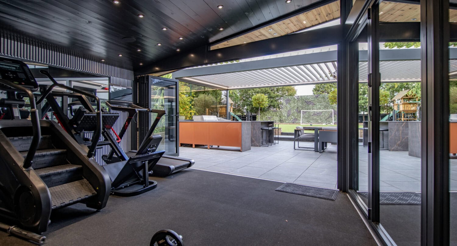 High-quality bi-folding doors opening to a stylish outdoor patio, enhancing natural light and indoor-outdoor living in Harrogate. Perfect for contemporary home renovations.