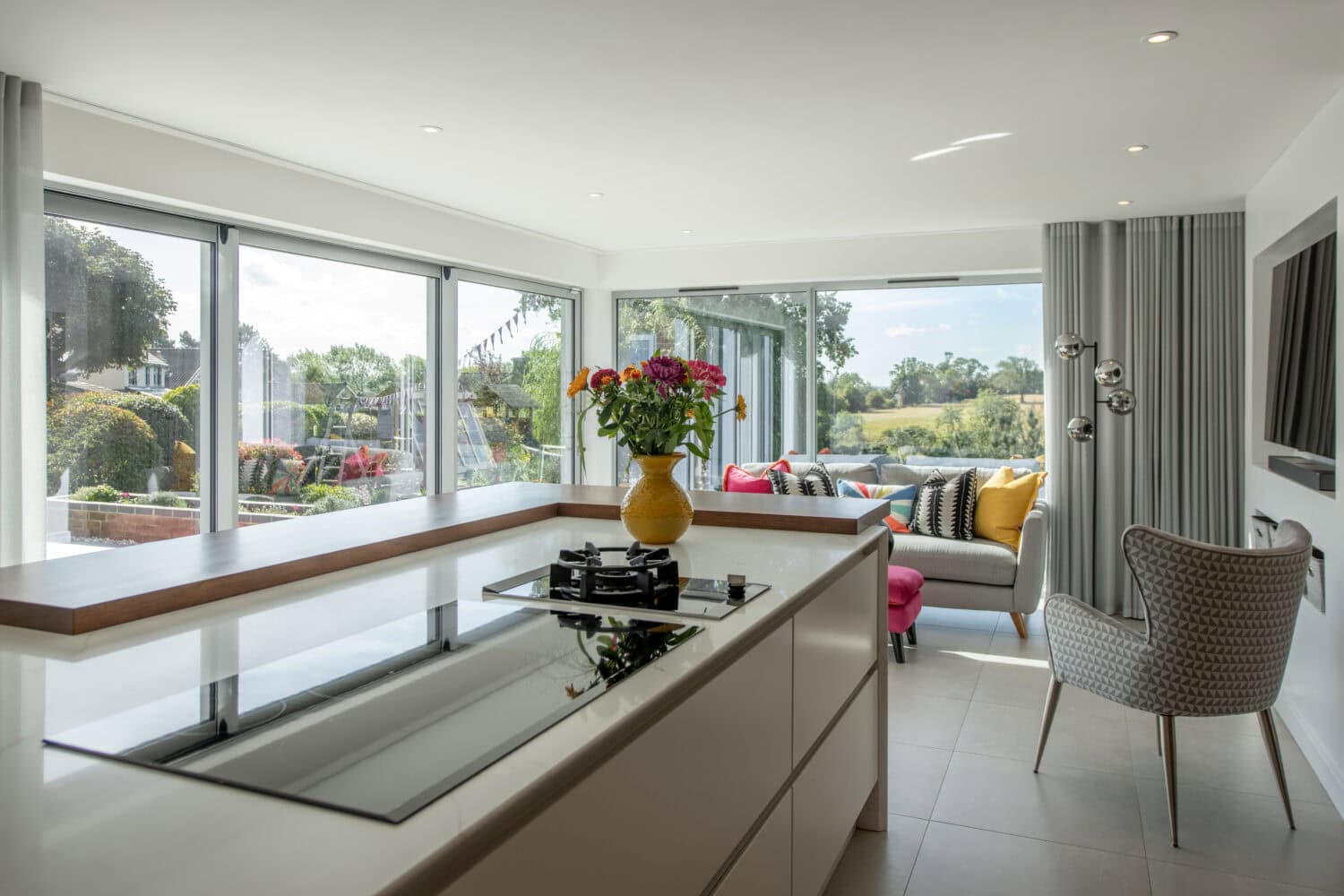 Elegant bi-folding doors opening to a bright, spacious living area at Firs Drive, Harrogate. Perfect for seamless indoor-outdoor living and enhancing natural light.