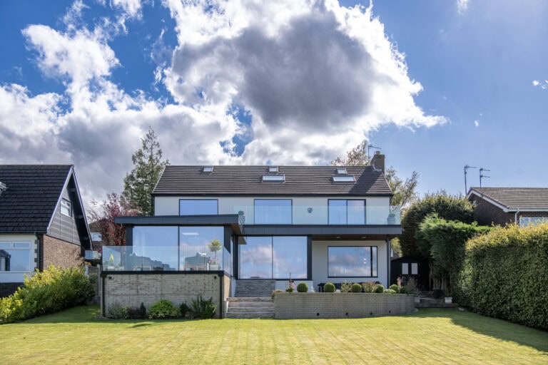 Contemporary bi-folding doors installed in a residential property in Colne, Lancashire, offering seamless indoor-outdoor living and enhanced natural light.