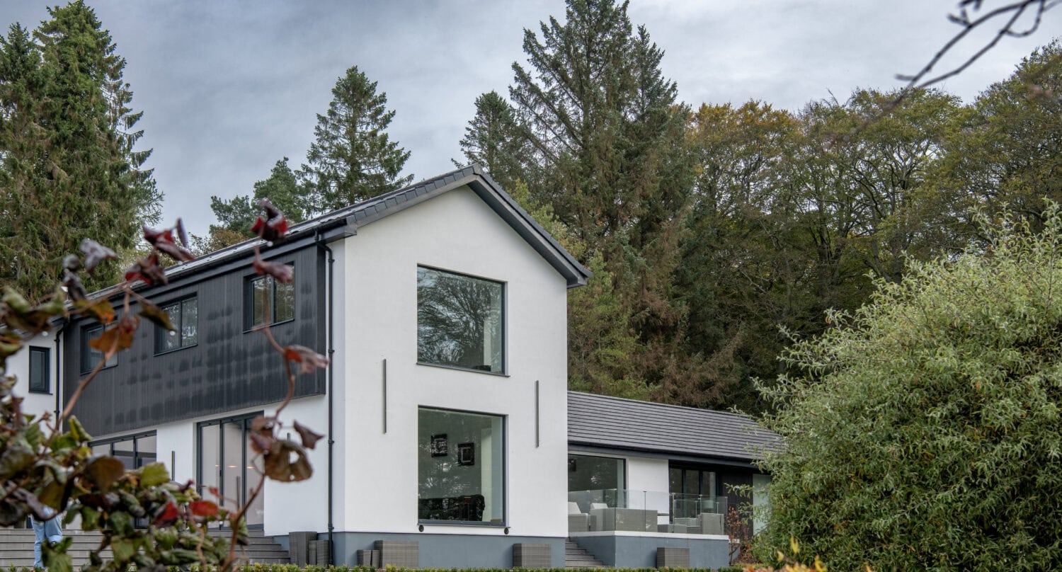 Bi-folding doors opening to the garden, enhancing natural light and outdoor views. Perfect for seamless indoor-outdoor living in Aberdeen.