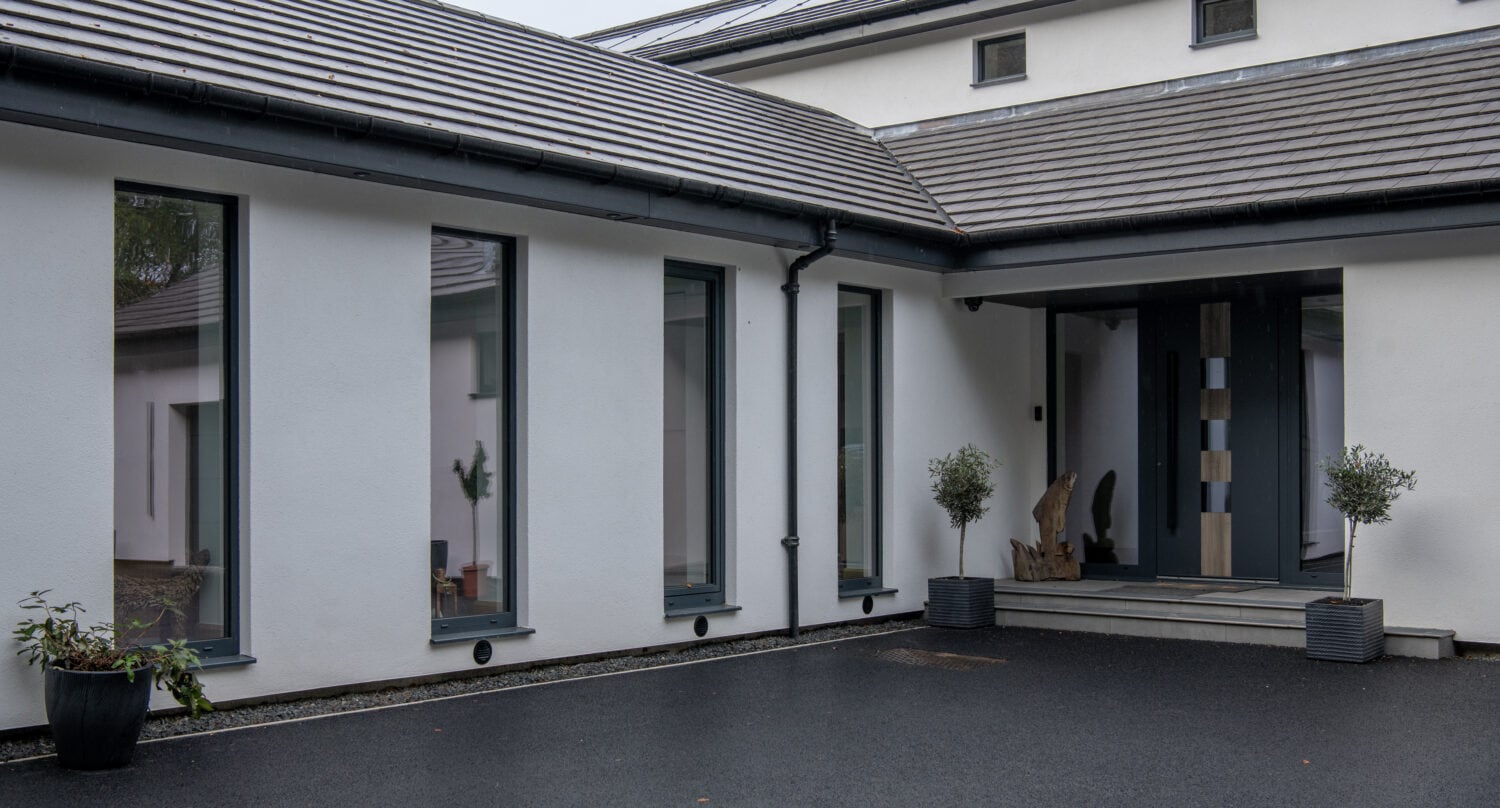 Modern garden house with large bi-folding doors providing seamless indoor-outdoor connection in Aberdeen. Perfect for stylish, functional outdoor living spaces.