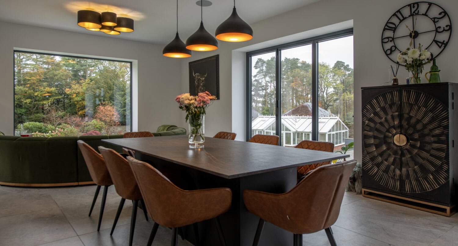 High-quality bi-folding doors opening to the garden, enhancing natural light and indoor-outdoor flow at The Garden House, Aberdeen. Perfect for stylish, functional home improvements.