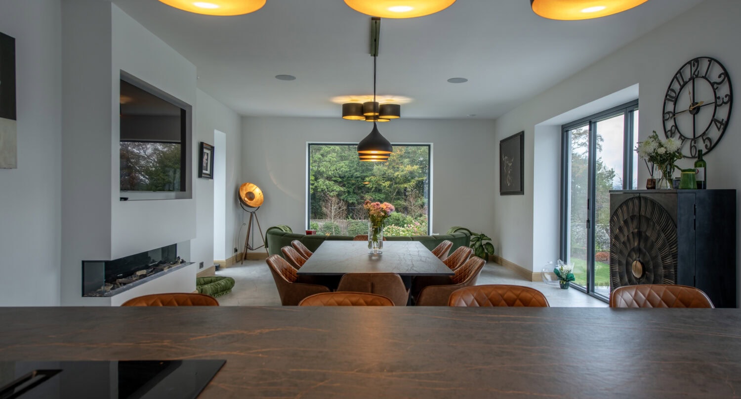 High-quality bi-folding doors opening to the garden in Aberdeen, enhancing natural light and indoor-outdoor flow. Perfect for modern garden houses seeking stylish, functional access solutions.
