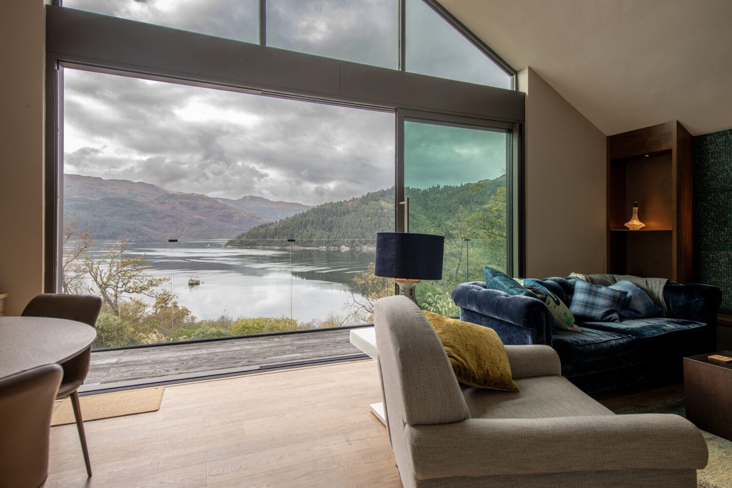 Bi-Folding Doors at Norse Lodge, Helensburgh offering stunning lake views and modern design. Perfect for enhancing natural light and indoor-outdoor living spaces.