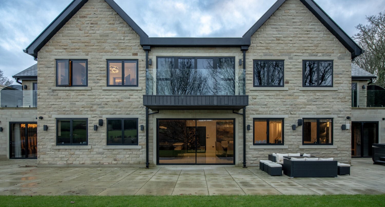 Steel look bi-fold doors offering sleek, contemporary style and durability for your home. Perfect for creating seamless indoor-outdoor living spaces with high-quality, secure, and stylish folding door.