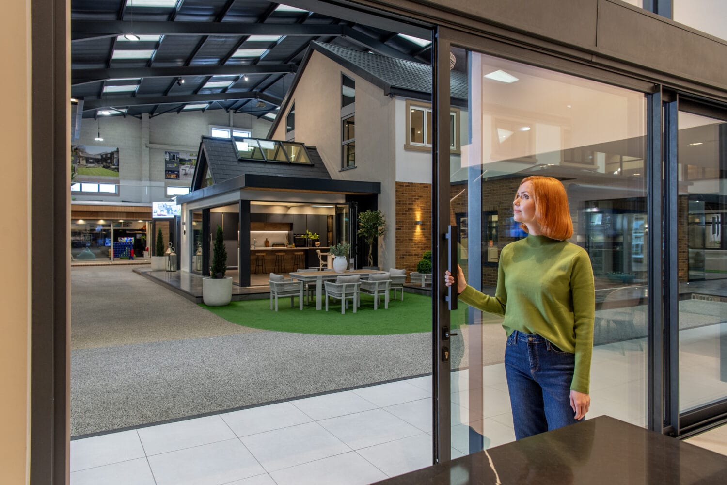 Bi-Folding doors offering seamless indoor-outdoor living solutions at our new Milton Keynes showroom opening March 16th. Perfect for homes seeking stylish, functional, and space-saving door options.