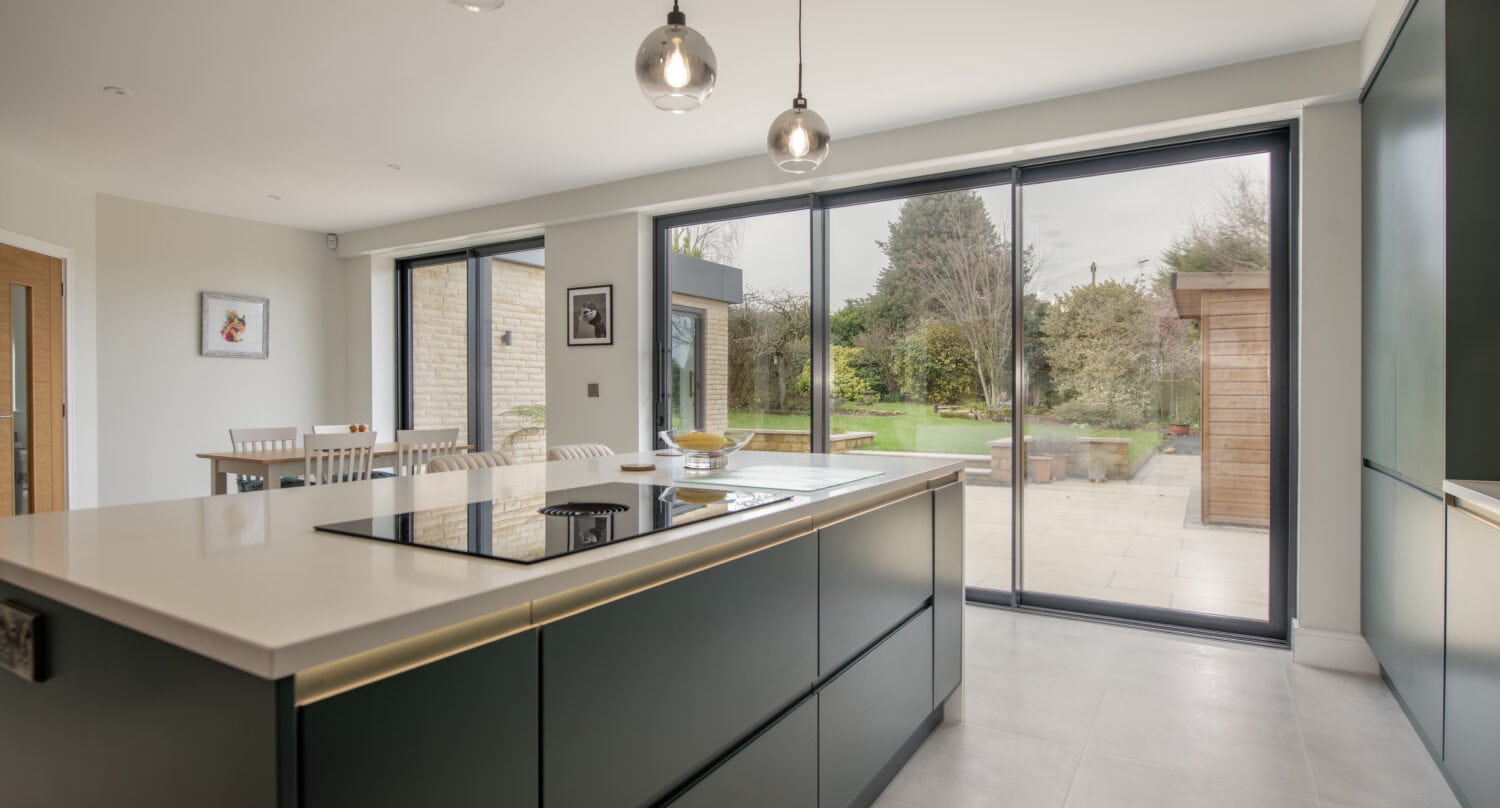 Elegant bi-folding doors opening to a garden in Chapel Grove home.
