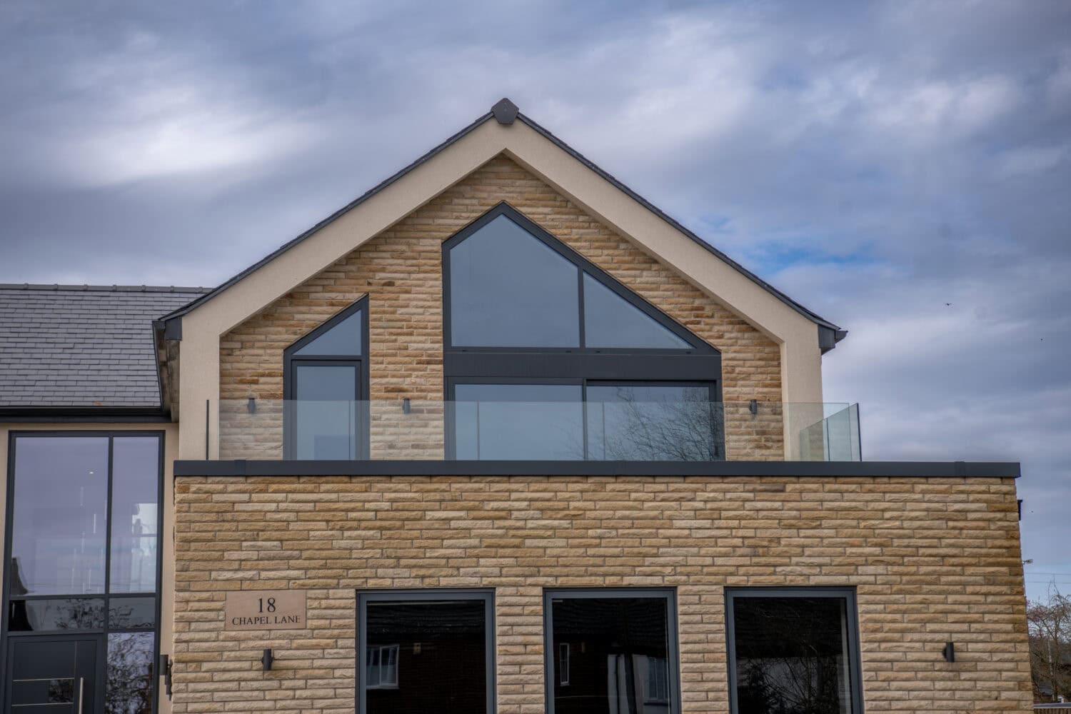 Elegant bi-folding doors at Chapel Grove enhance natural light and outdoor views. Perfect for contemporary homes, these doors offer seamless indoor-outdoor living with stylish design and superior func.