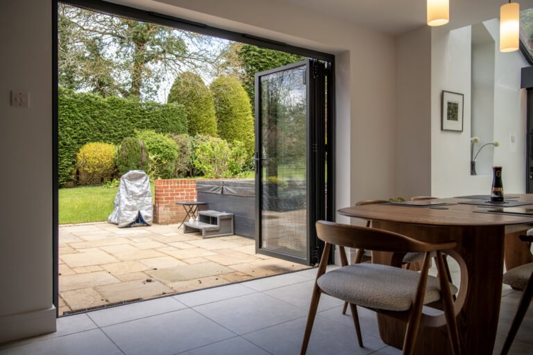 High-Quality Bi-Folding Doors Opening to Garden.