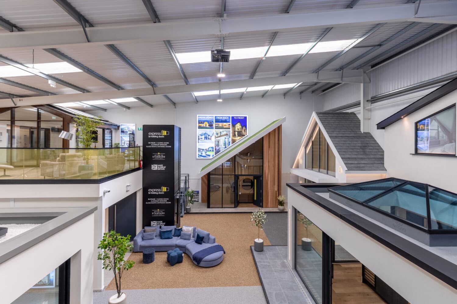 Elegant Milton Keynes showroom featuring modern bi-folding doors, showcasing seamless indoor-outdoor living solutions with high-quality, energy-efficient designs for stylish home improvements.