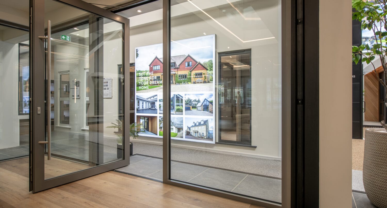 Modern bi-folding doors at Milton Keynes showroom showcasing seamless indoor-outdoor transition and contemporary design.