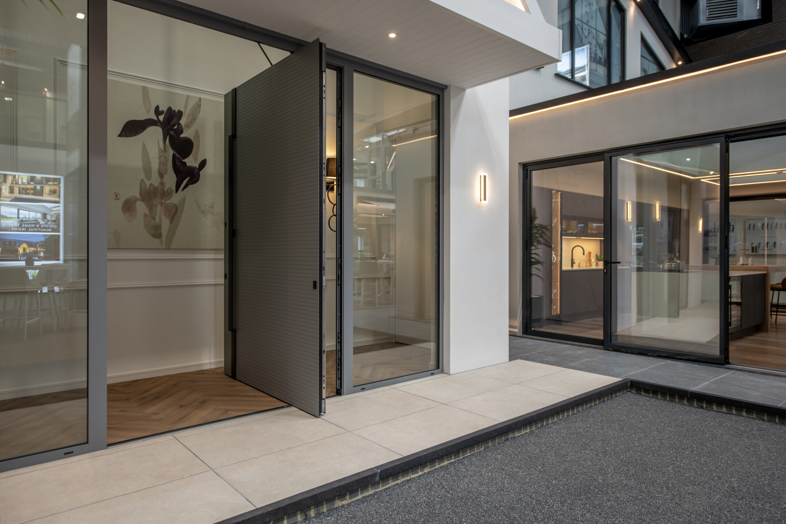 Modern bi-fold doors at Milton Keynes showroom, showcasing sleek design and seamless indoor-outdoor transition.