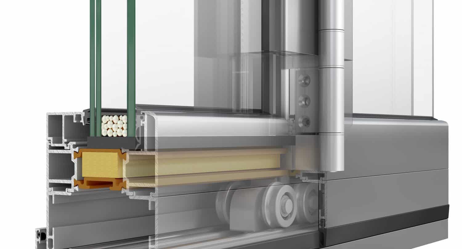 Cross-section of a modern sliding glass door frame showing metal, insulation layers, rubber seals, glass panes, and roller mechanisms—similar in construction to bifold doors—for smooth operation and energy efficiency.
