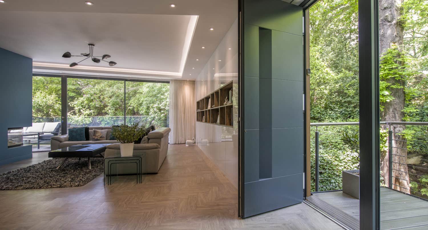 Opened luxury aluminium entrance door with 4 linear panels