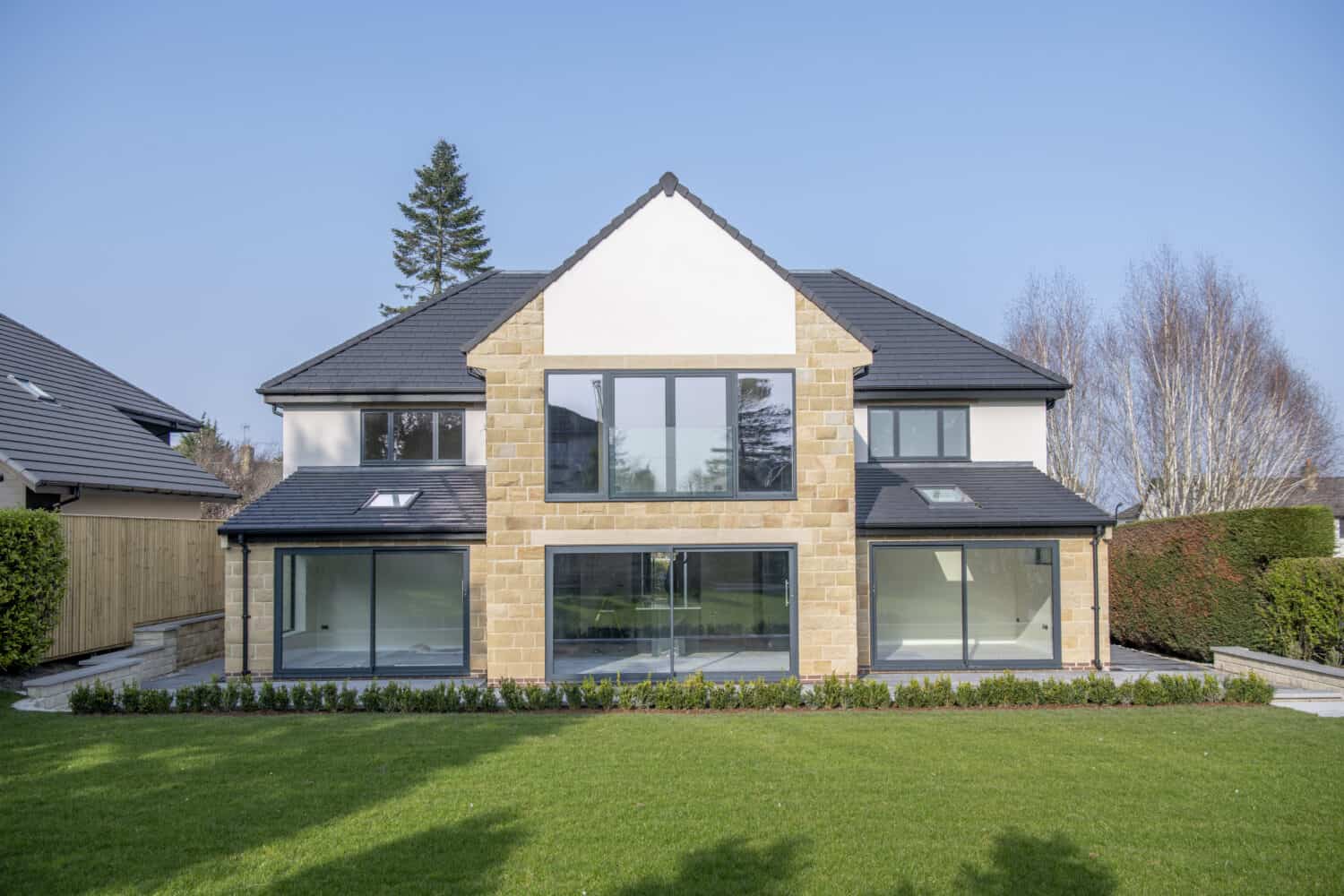 Luxury detached home with bespoke panoramic sliding doors