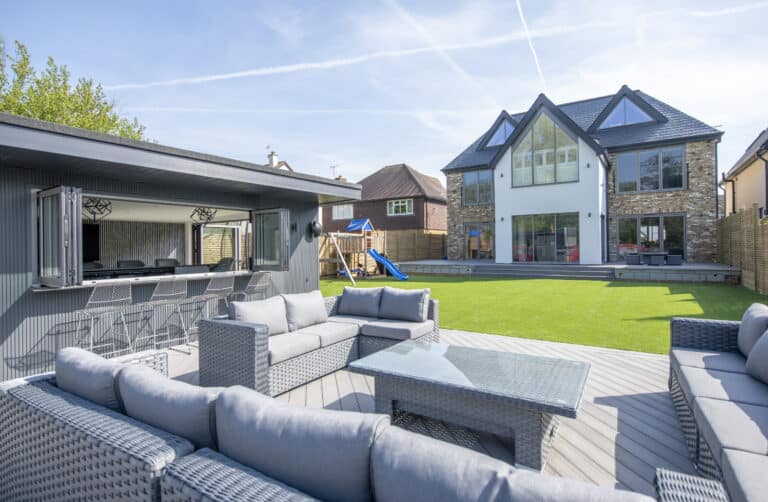 Stunning garden social space complete with bar and bifold casement windows