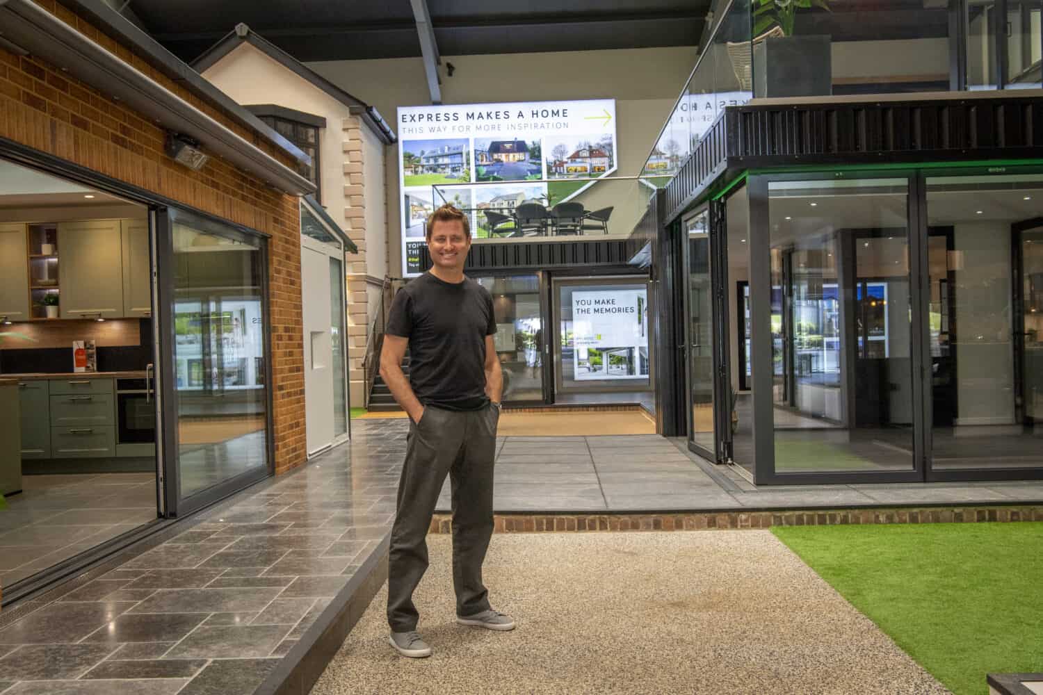 Man standing in Express Bi Folding Doors showroom