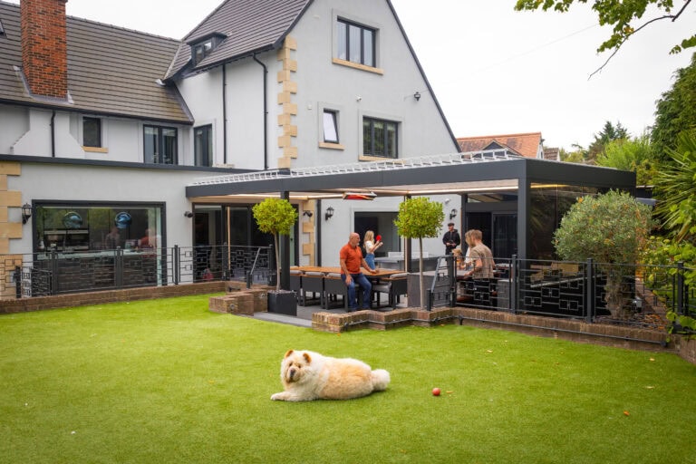 Elegant bi-folding doors opening to a stylish outdoor patio in Leadhall Lane, Harrogate. Perfect for seamless indoor-outdoor living and entertaining.