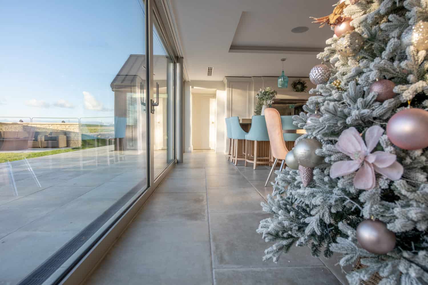 aluminium sliding doors and a christmas tree