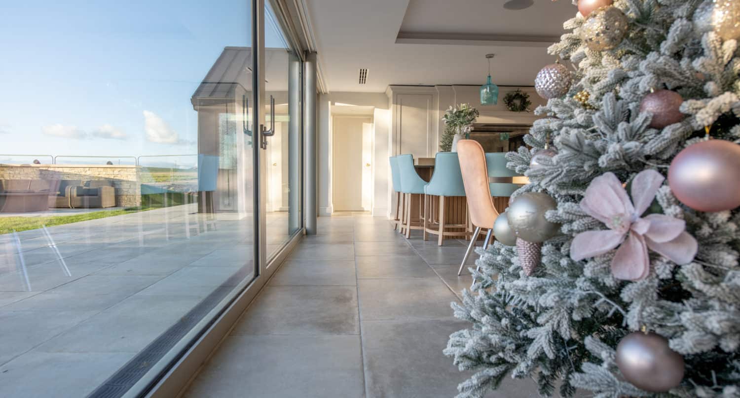 aluminium sliding doors and a christmas tree