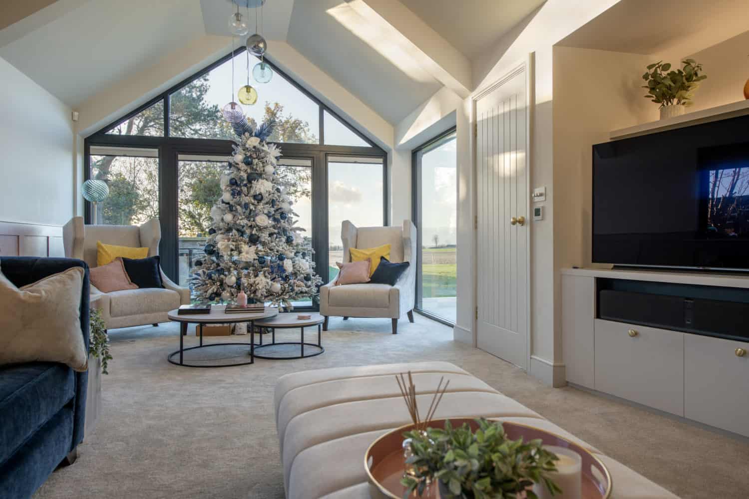 aluminium features in a living room with a christmas tree