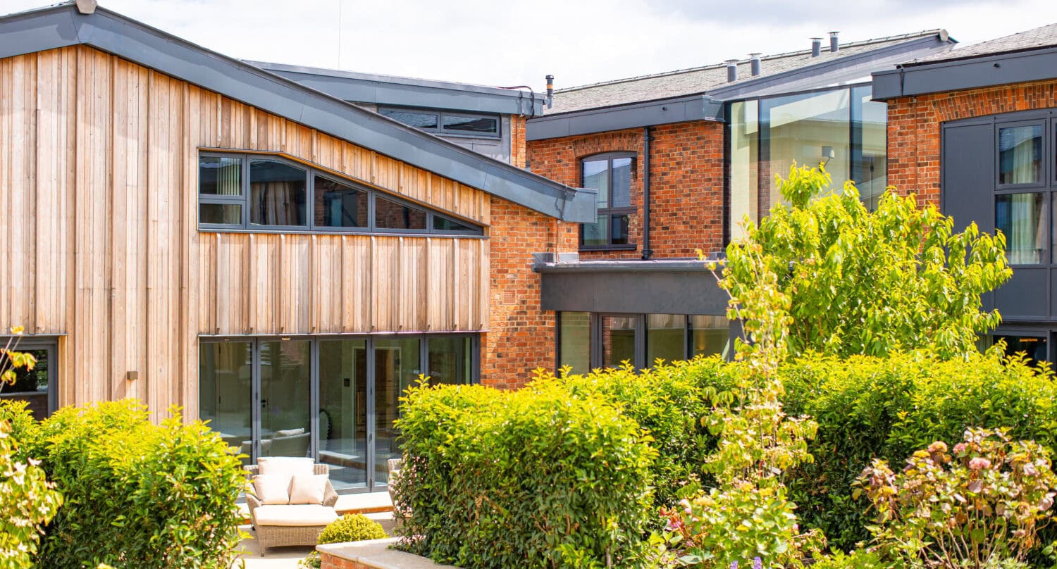 House exterior with aluminium features and wood