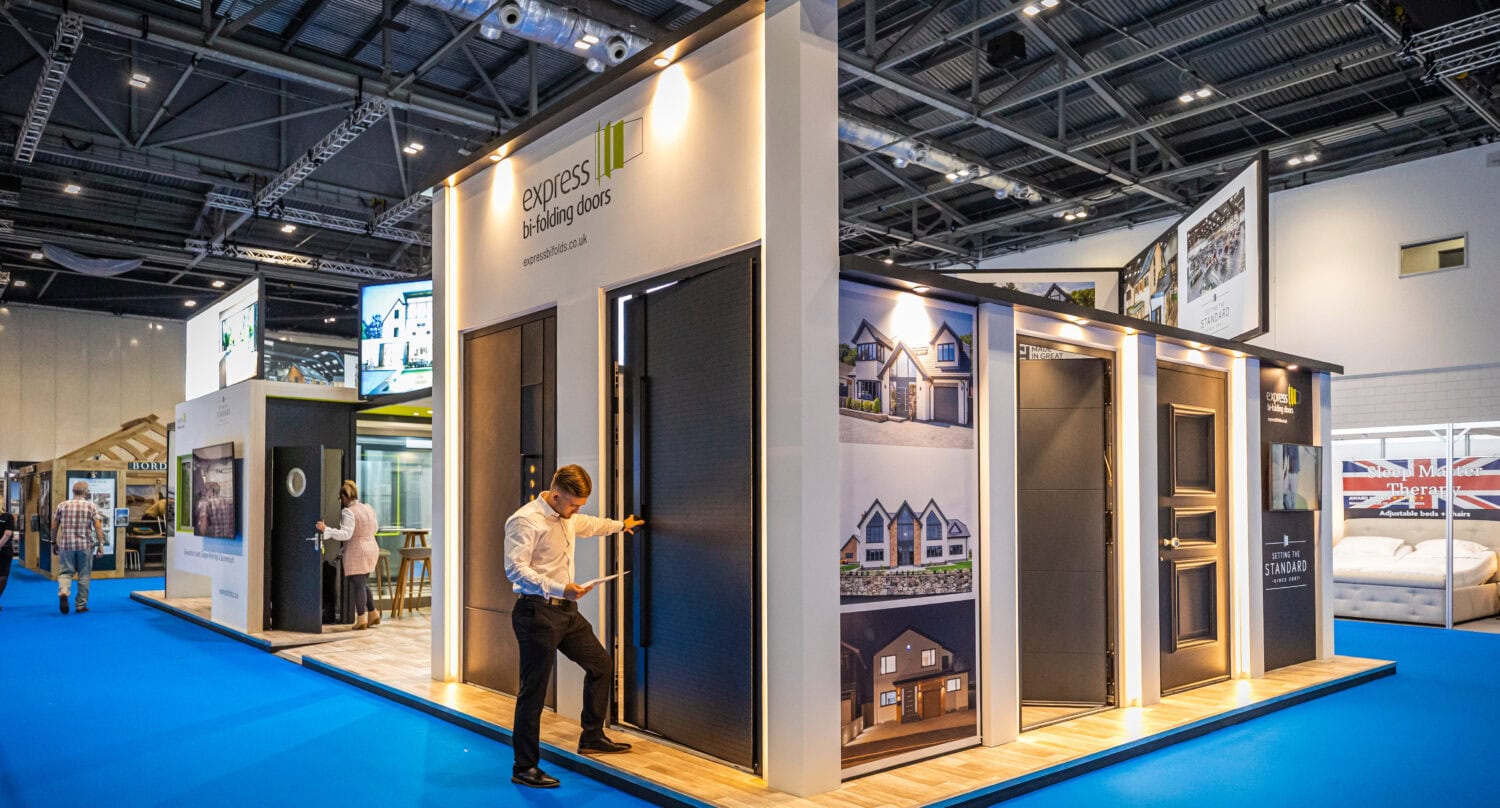 Showcasing modern bi-folding doors at the upcoming industry exhibition, highlighting their sleek design and versatility for residential and commercial properties.