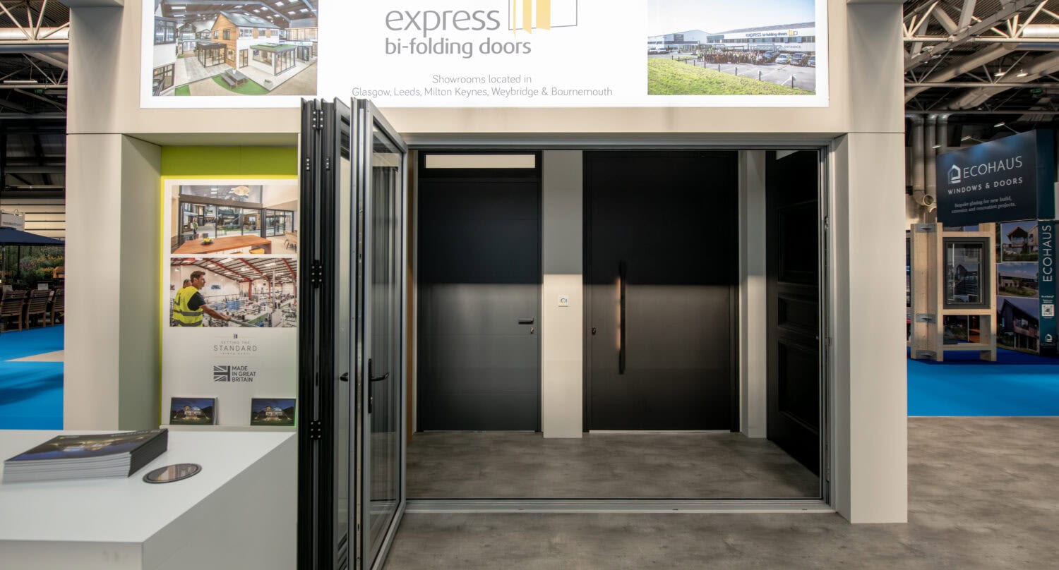 High-quality bi-folding doors by Express, showcased at industry exhibitions, highlighting innovative design and seamless indoor-outdoor transitions for modern spaces.