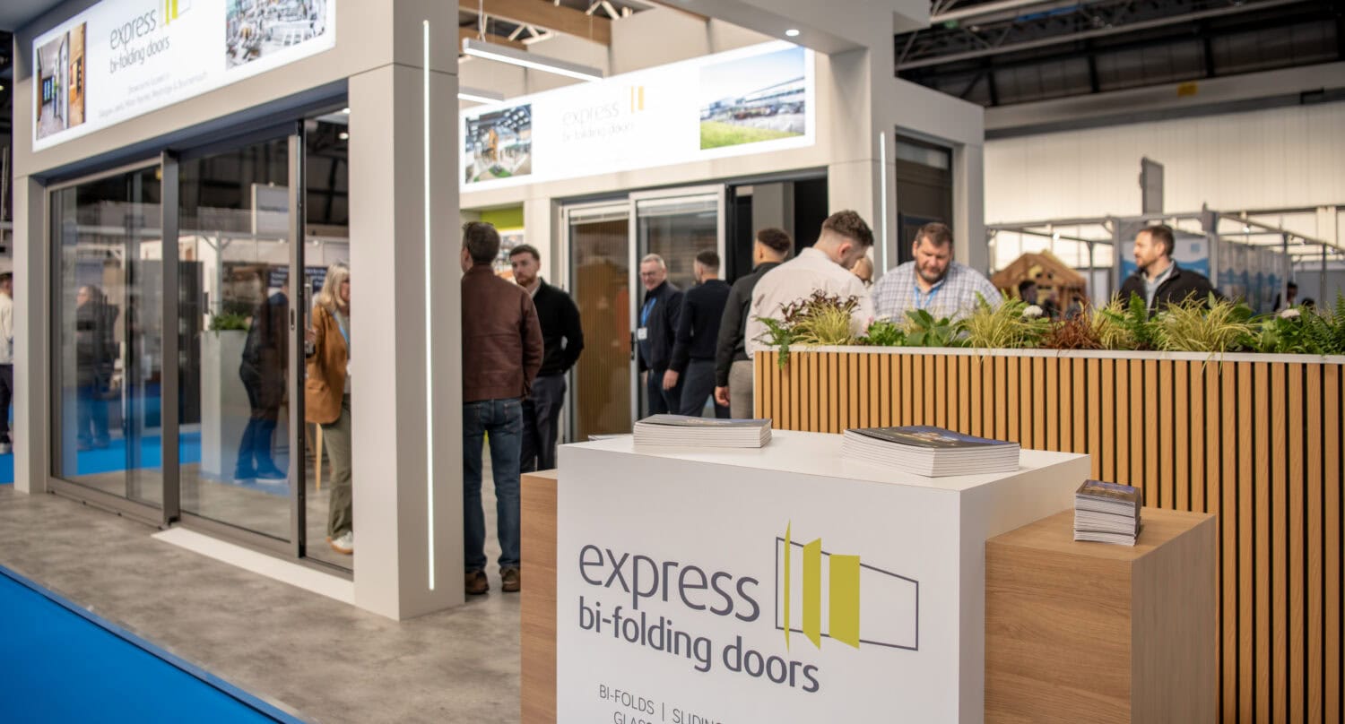 High-quality bi-folding doors at trade show stand.