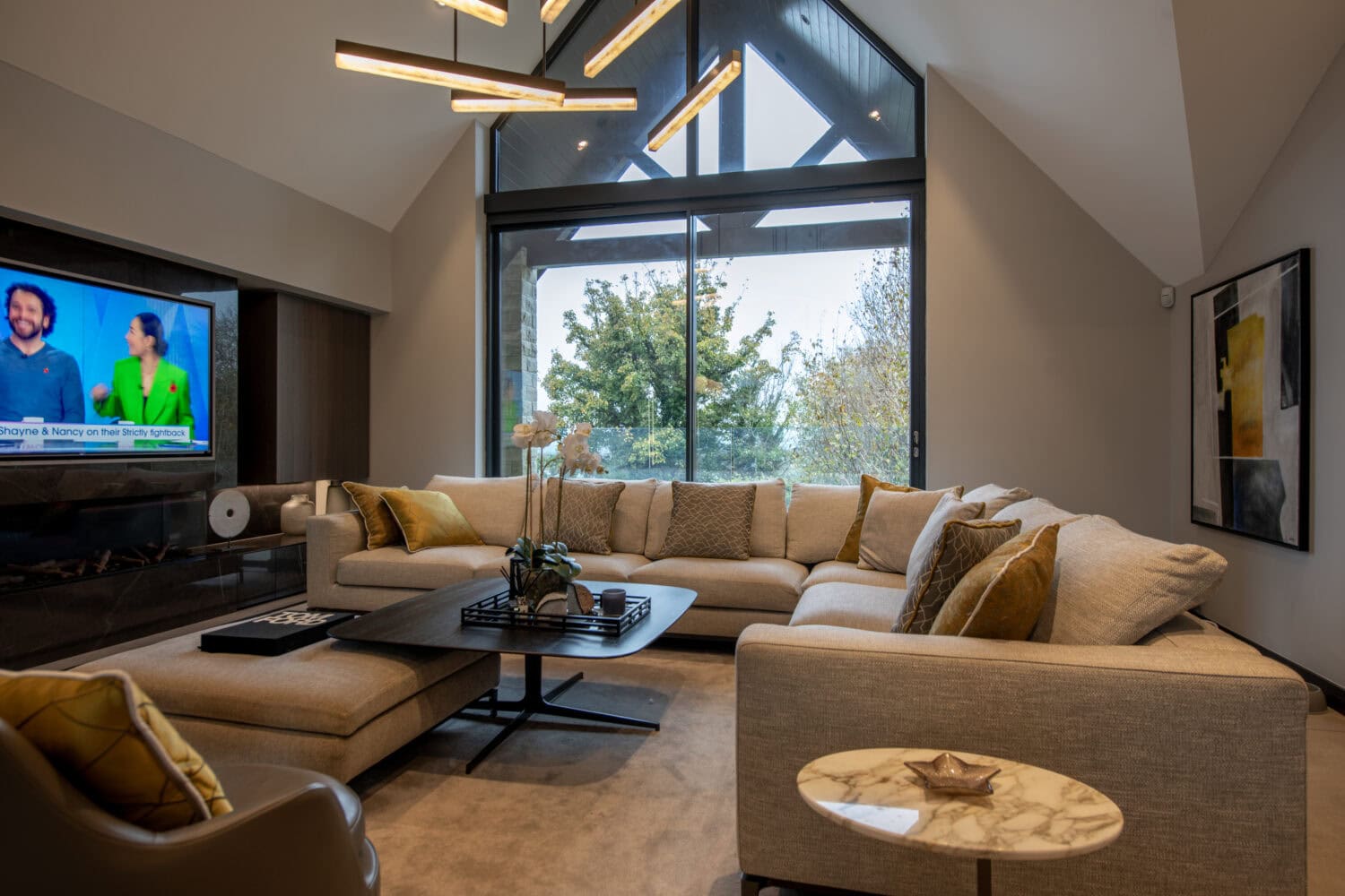 Large, comfortable living room with aluminium windows