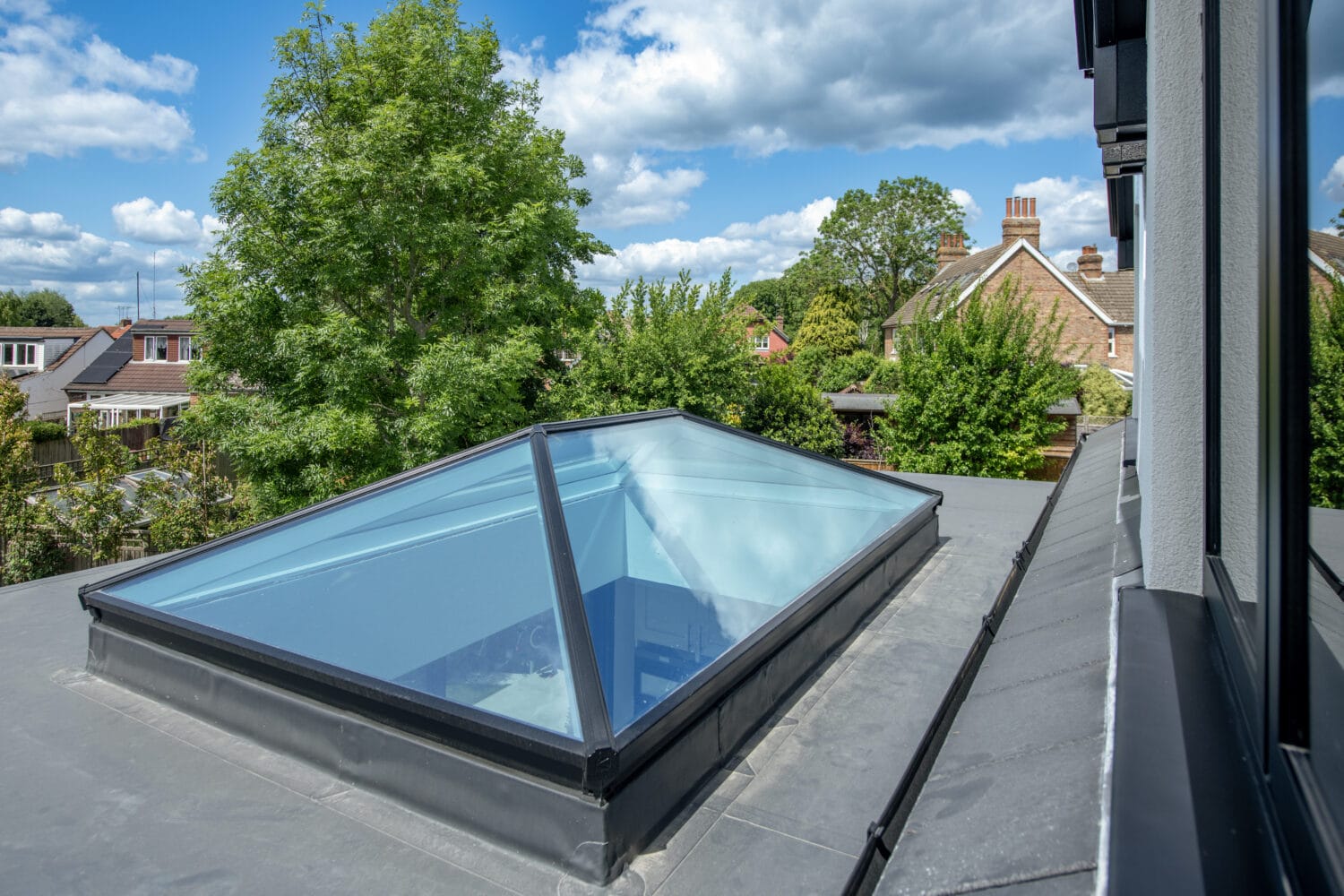 Skylight roof window, natural light, modern home design, roof glazing, daylight enhancement.