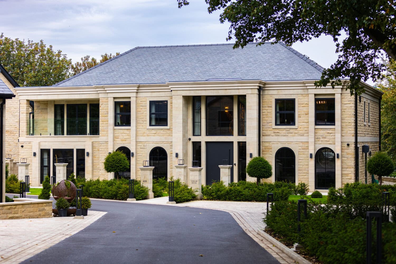 Elegant bi-folding doors opening to the garden in Arlington luxury development.