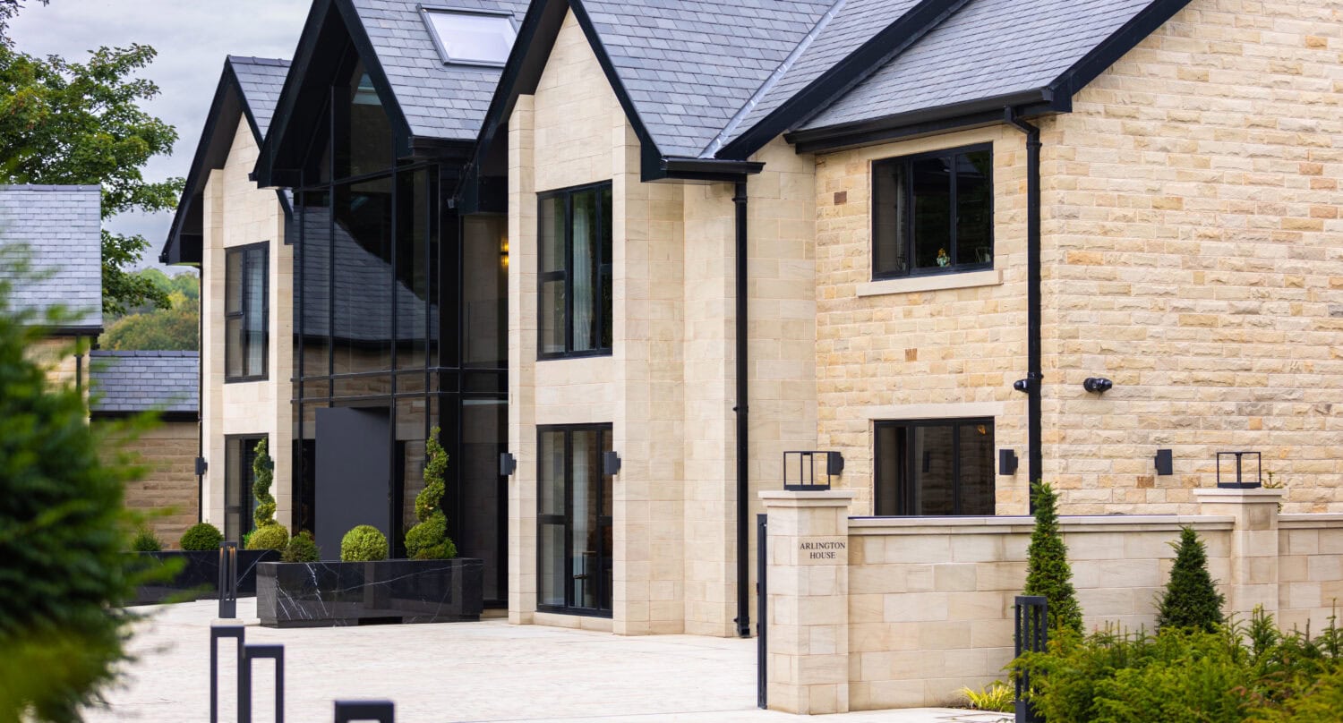 Pivot doors with sleek glass panels and contemporary design, perfect for enhancing the entrance of modern homes. Customisable options available for a seamless indoor-outdoor transition.