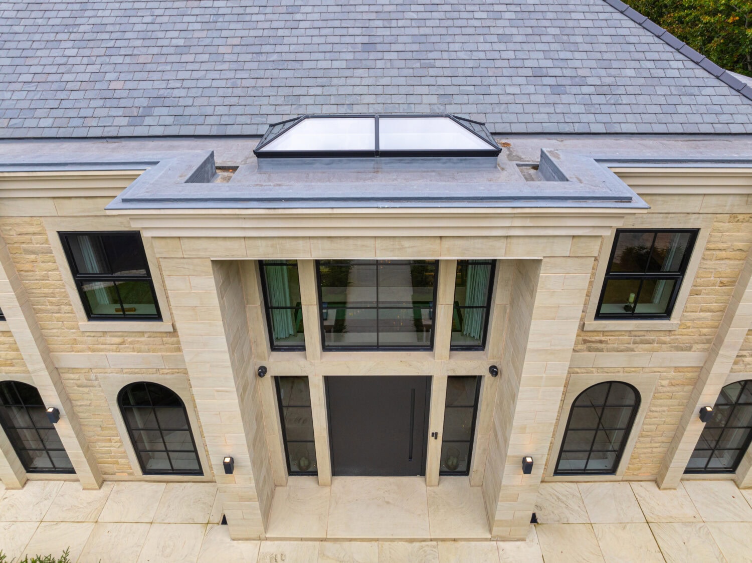 High-quality bi-folding doors installed at Arlington Luxury Development, enhancing natural light and outdoor views with sleek, modern design and superior functionality.