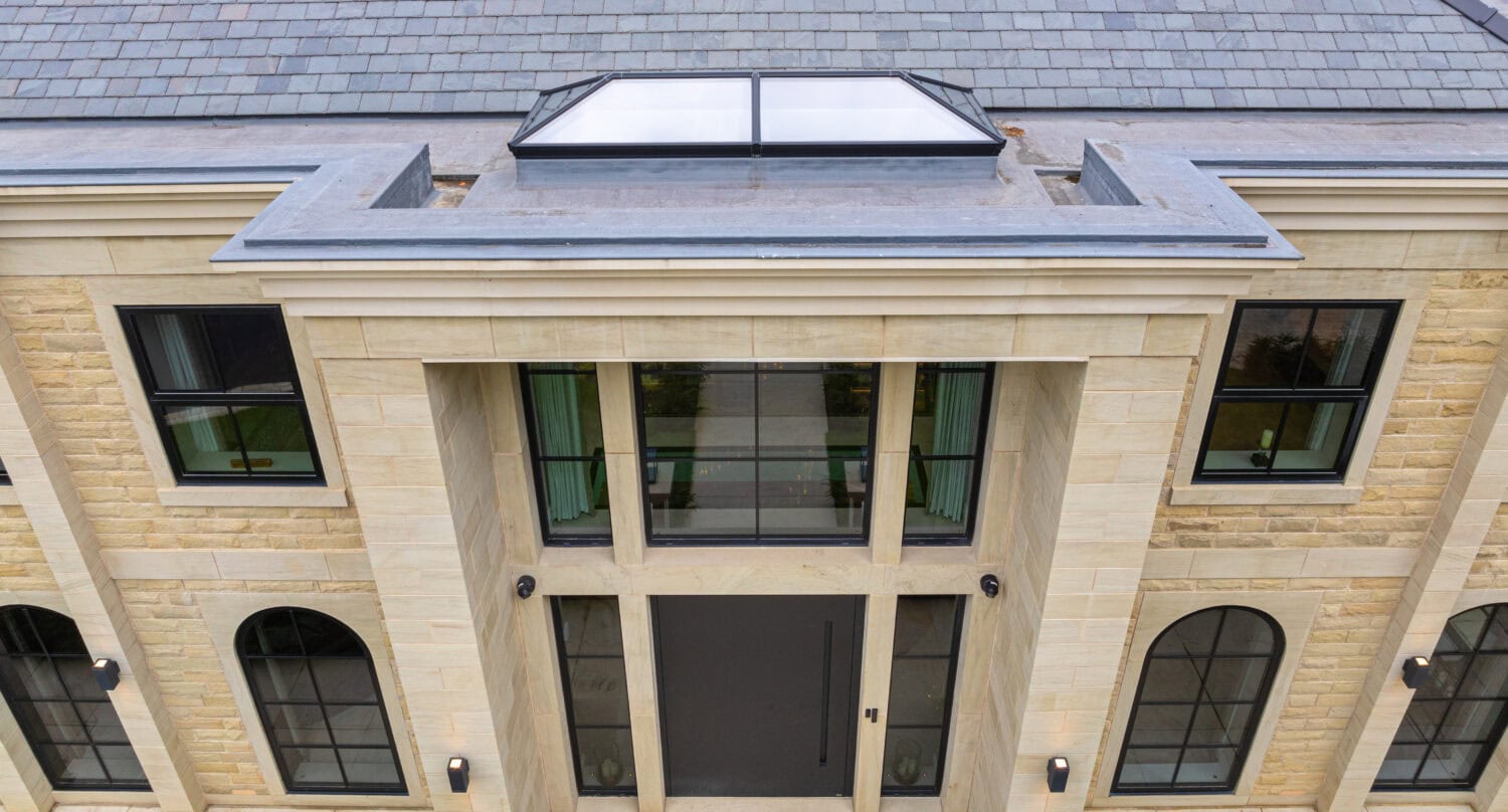 High-quality bi-folding doors installed at Arlington Luxury Development, enhancing natural light and outdoor views with sleek, modern design and superior functionality.