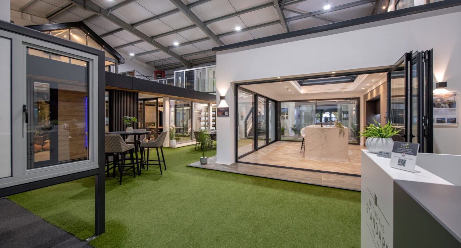 Elegant bi-folding doors opening to a bright, modern interior at Glasgow showroom.