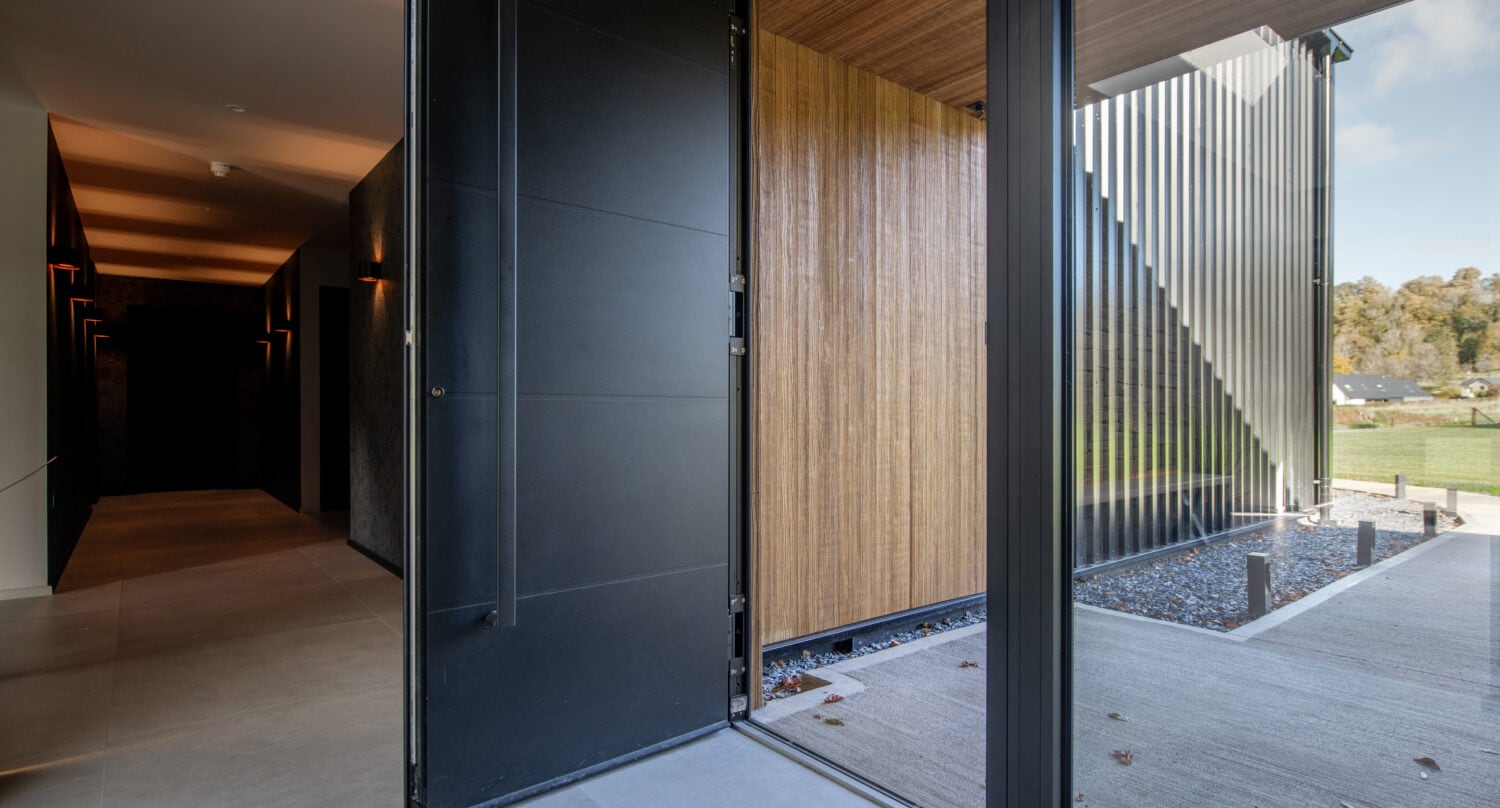 High-quality bi-folding doors from Express Bifolds, ideal for seamless indoor-outdoor living at Orchard Farm, Crossford. Durable, stylish, and energy-efficient folding door solutions.