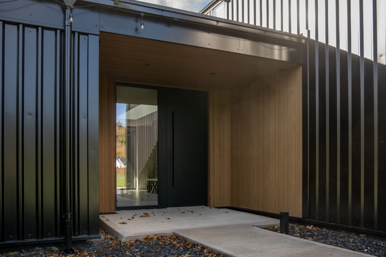 Modern black bi-folding doors at Orchard Farm, Crossford.