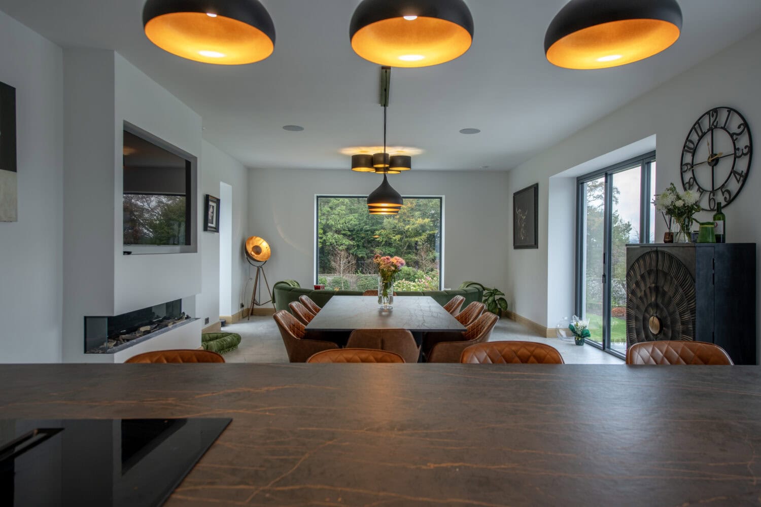 High-quality bi-folding doors opening to the garden in Aberdeen, enhancing natural light and indoor-outdoor flow. Perfect for modern garden houses seeking stylish, functional access solutions.