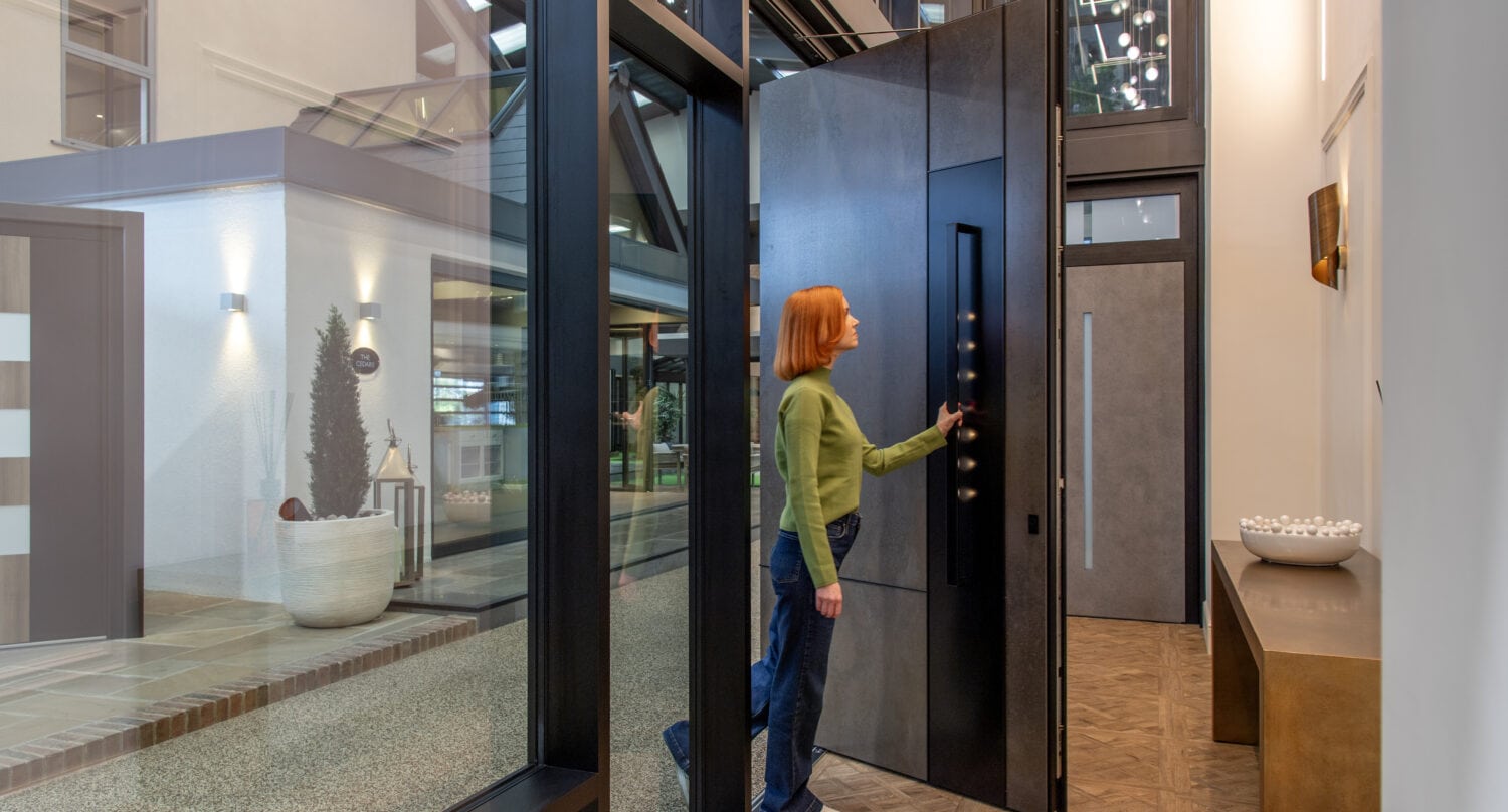 Elegant pivot doors installed in a contemporary interior, showcasing sleek design and smooth operation, ideal for enhancing aesthetic appeal and functionality.