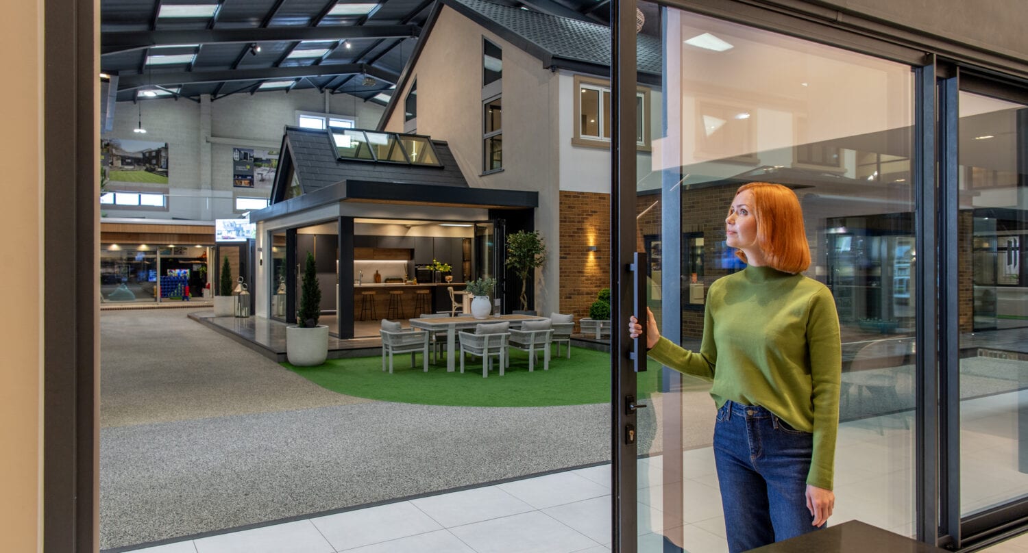 Bi-Folding doors offering seamless indoor-outdoor living solutions at our new Milton Keynes showroom opening March 16th. Perfect for homes seeking stylish, functional, and space-saving door options.