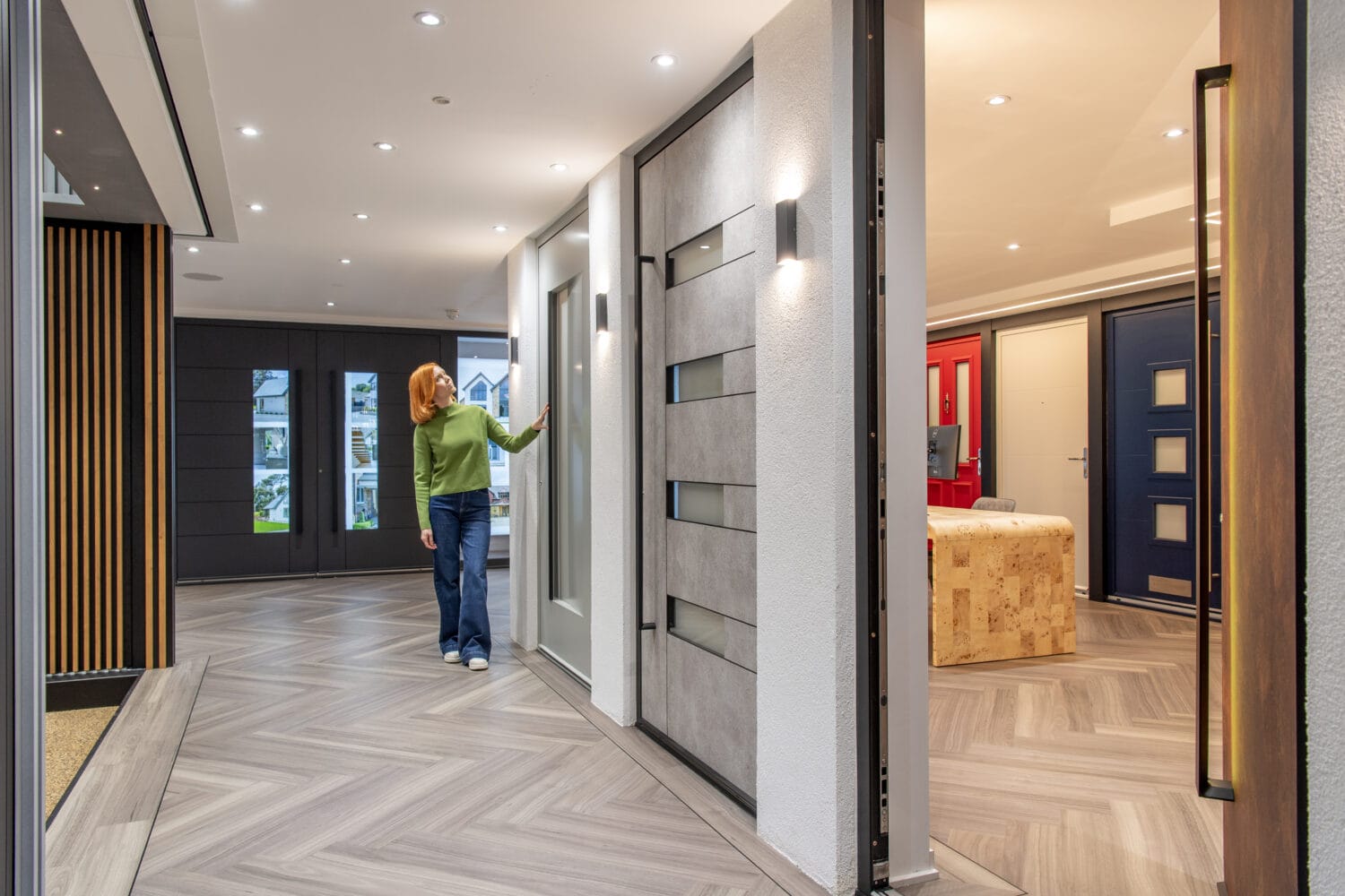 Modern bi-folding doors display at the new Milton Keynes showroom opening March 16th, showcasing stylish and functional solutions for contemporary home interiors.