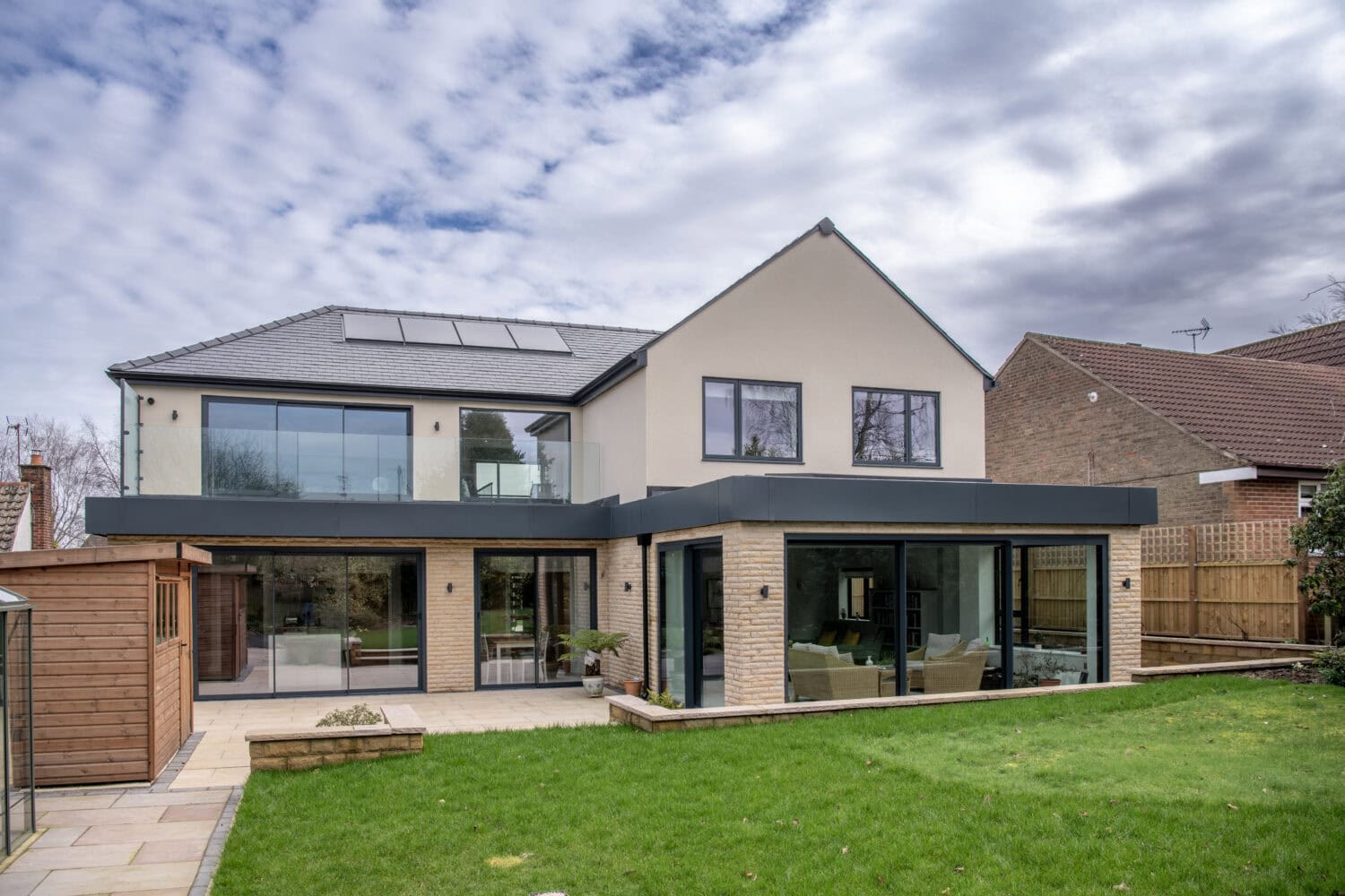 Bi-fold doors at Chapel Grove showcase seamless indoor-outdoor living with stylish, energy-efficient glass panels.
