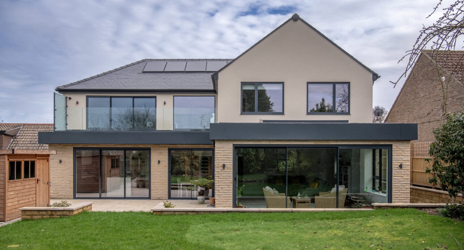 Elegant bi-folding doors from Express Bi-Folds at Chapel Grove, enhancing natural light and outdoor views. Perfect for contemporary homes seeking stylish, functional access solutions.