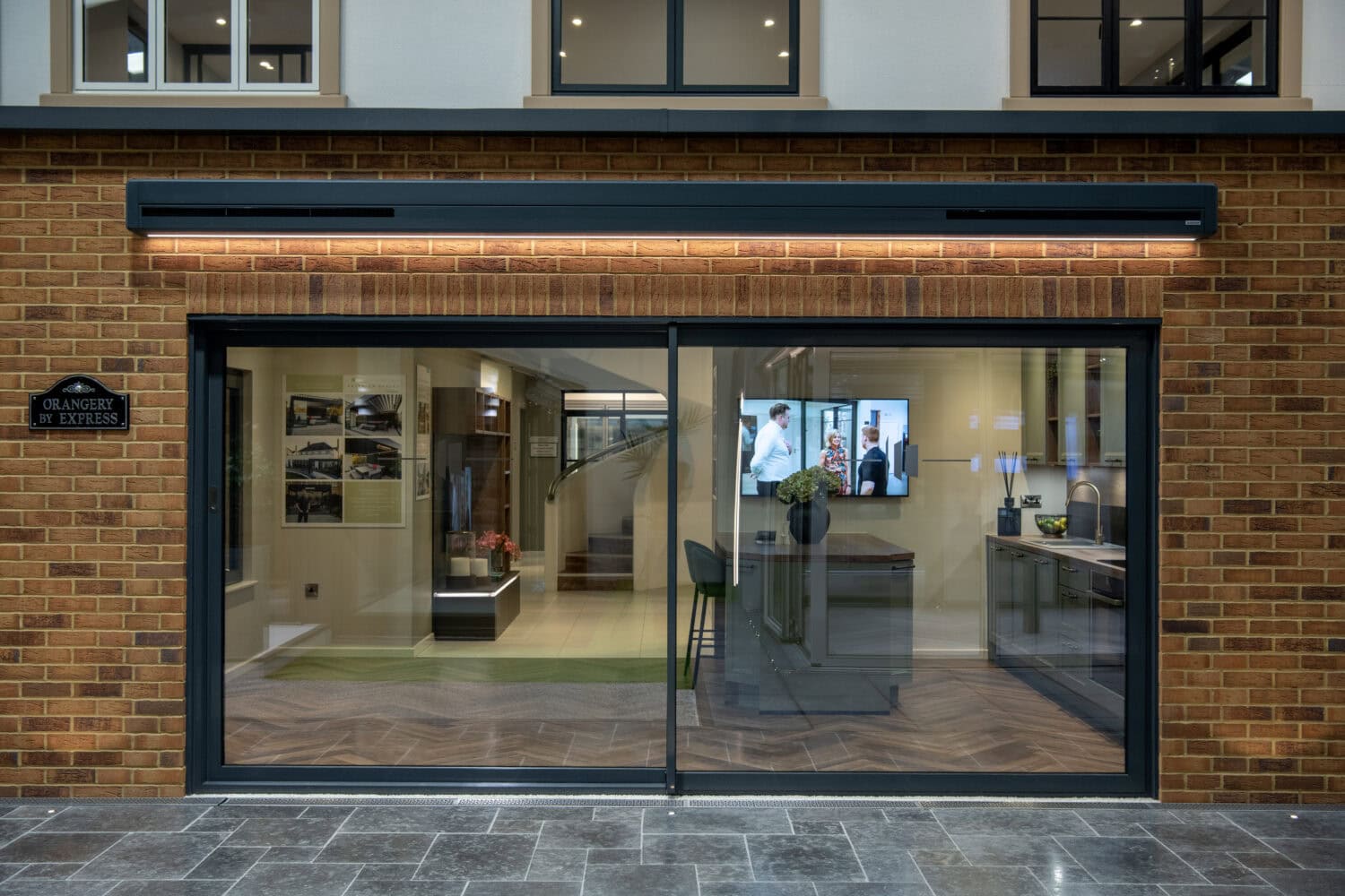 High-quality bi-fold patio doors opening to outdoor space, enhancing modern home aesthetics and functionality. Perfect for seamless indoor-outdoor living and entertaining.