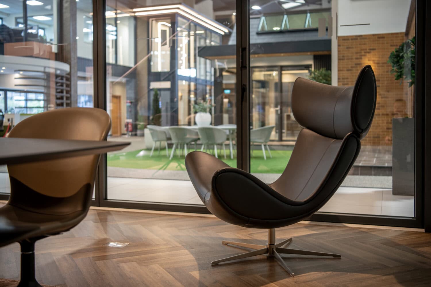 Elegant bi-folding doors opening to a modern Leeds showroom, showcasing stylish interior design and seamless indoor-outdoor transition solutions. Perfect for enhancing home aesthetics.