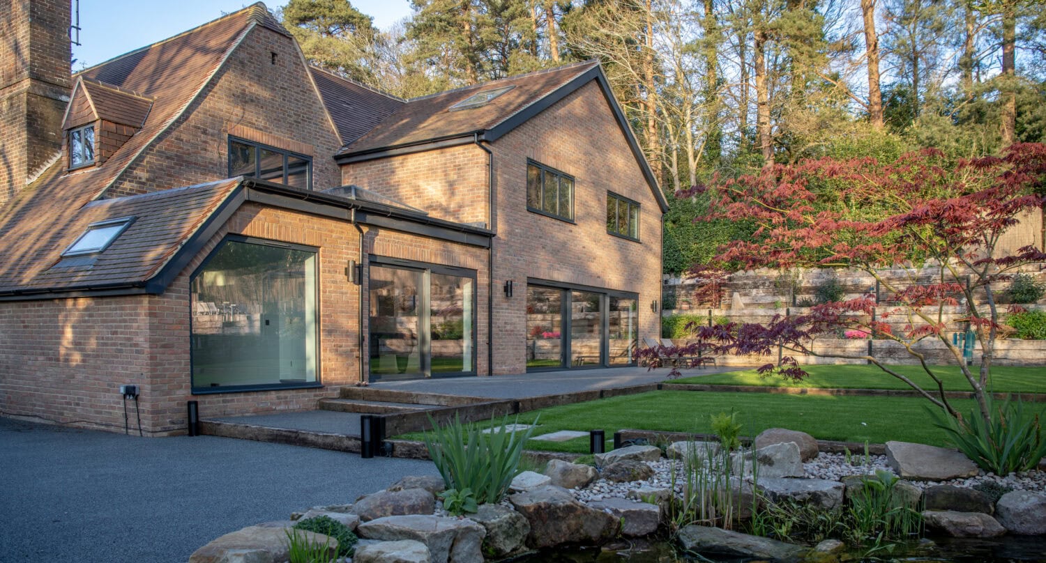 Elegant bi-fold doors enhance the home's aesthetic and provide seamless indoor-outdoor living.