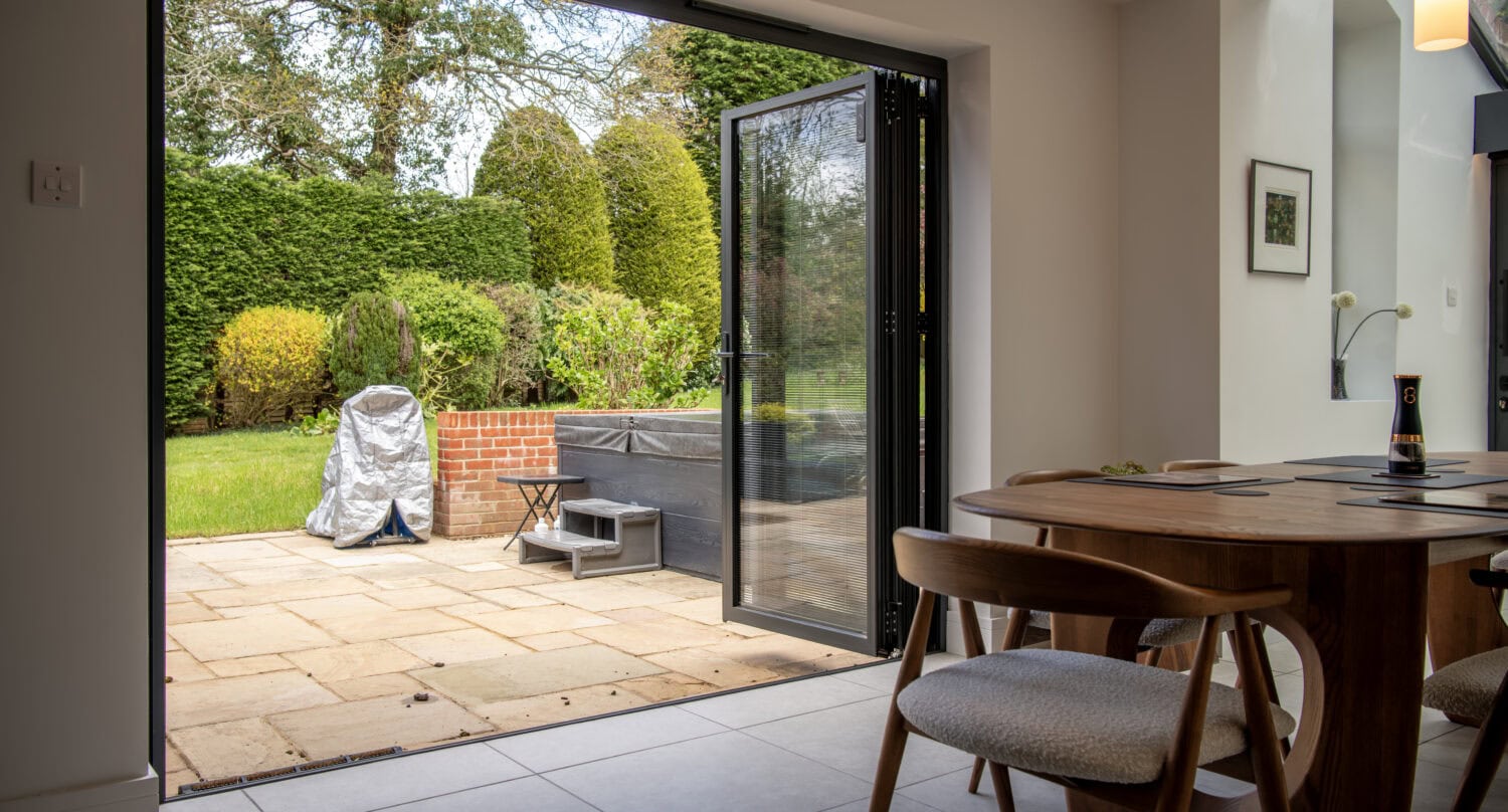High-Quality Bi-Folding Doors Opening to Garden.
