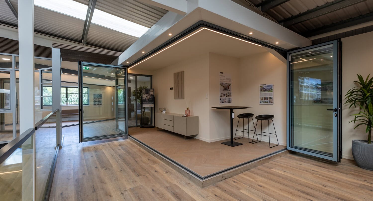 Enhanced natural light with modern Milton Keynes showroom featuring high-quality aluminium bi-folding doors for seamless indoor-outdoor living. Perfect for stylish home renovations.