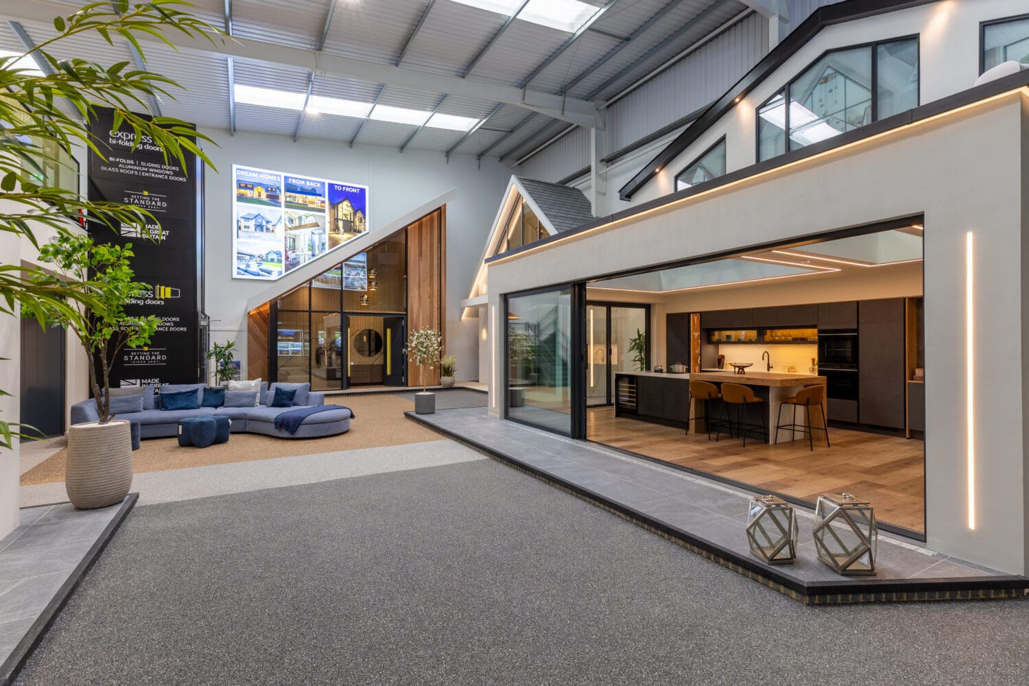 High-quality aluminium bi-folding doors showcased in a modern Milton Keynes showroom, offering seamless indoor-outdoor living solutions with enhanced natural light and stylish design.